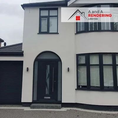 Rendered detached house with smooth white silicone render finish